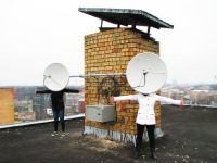 Satellitenschüssel  Köpfe