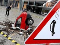 Vorsicht vor fallenden Autos